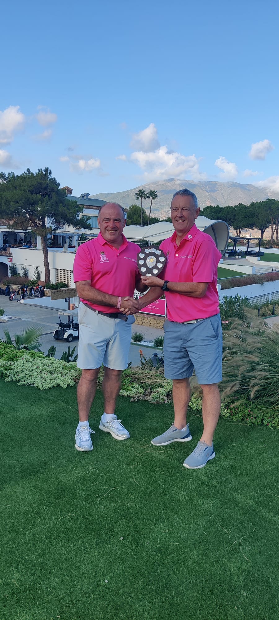 John Swan receiving the ROGS shield from Rick Kennedy
